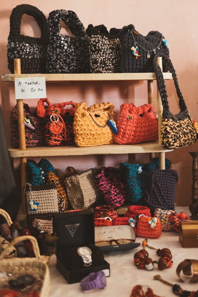 Vibrant crochet bags showcased on shelves in Rabat, Morocco local store.